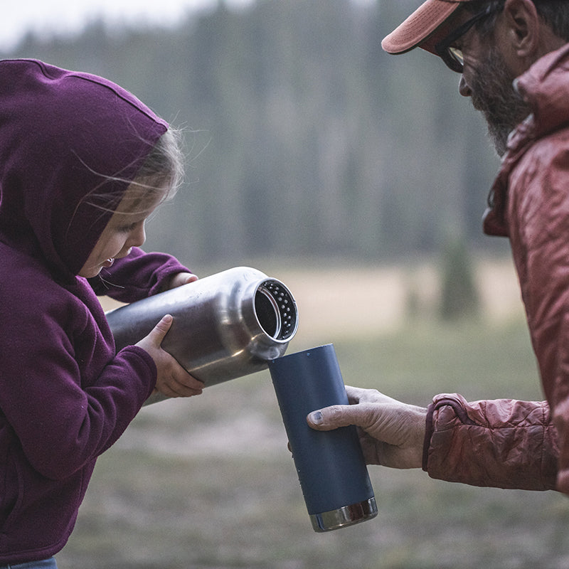 64oz-tkwide-with-loop-cap-k8 tkwide_64oz_bottle_girl_dad_filling_square.jpg